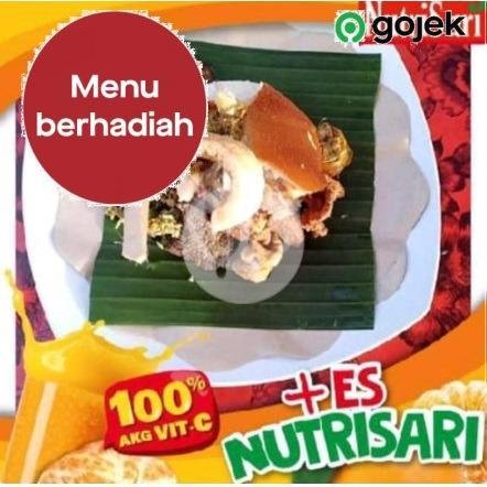 Babi Guling Besar + Nutrisari menu Warung Wenten Babi Guling, Batubulan