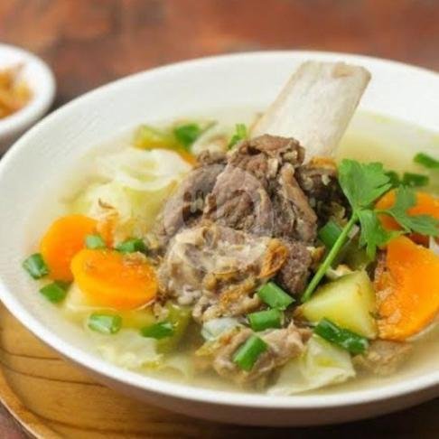 Soup iga bakar(pork rib soup) +potato+fresh tomato+sprout+carrot+rice menu Aksata Bar, Canggu