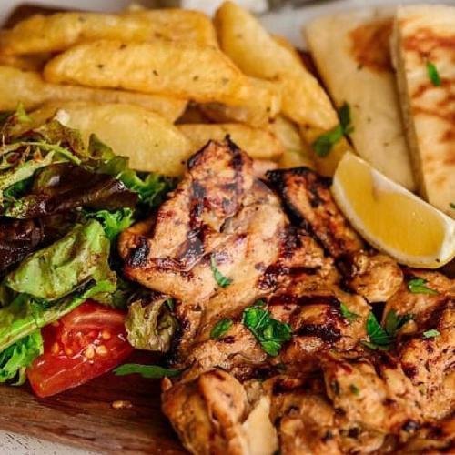 Grilled Chicken Leg Boneless menu Nostimo Greek Grill, Petitenget
