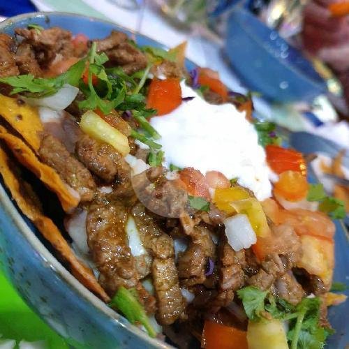 New!                                           Steak Nachos Supreme menu Taco Beach Mexican Grill, Seminyak