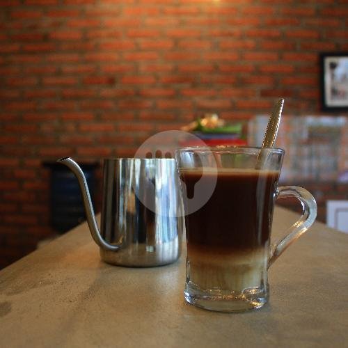 Kopi Susu Panas menu M. Aboe Talib Kediri Tabanan