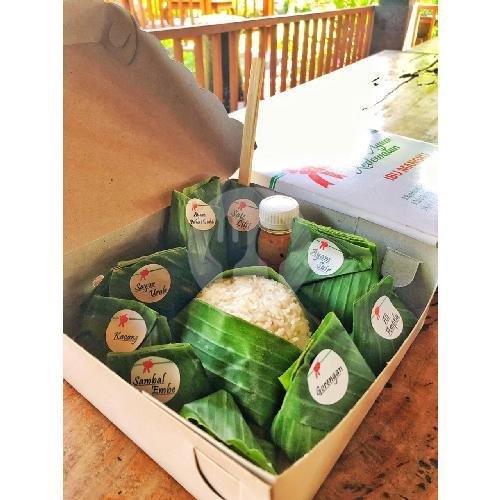 Nasi Bungkus Daun menu Nasi Ayam Kedewatan Ibu Mangku, Seminyak