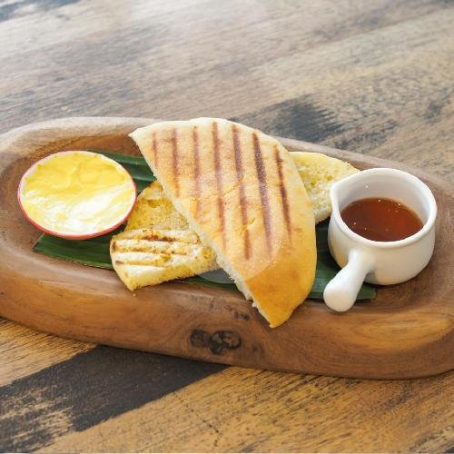 Toast With Butter And Honey menu The Koop Roaster & Cafe, Seminyak