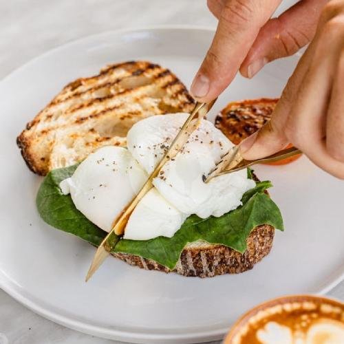 Egg On Sourdough menu Coffee Cartel (Coffee And Bakery), Seminyak