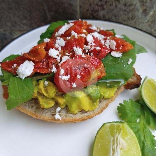 Tomato Avocado On Toast With Feta menu Naturela Cafe & Resto, Uluwatu